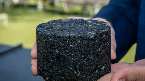 Asphalt binder with plastic